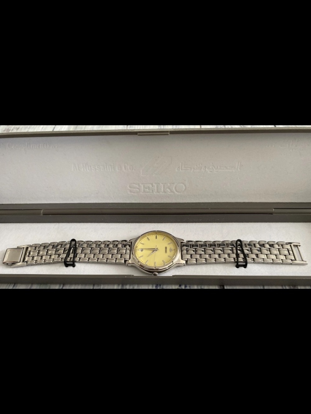 Seiko V732-0080 Men's Silver Bracelet Watch with Yellow Dial